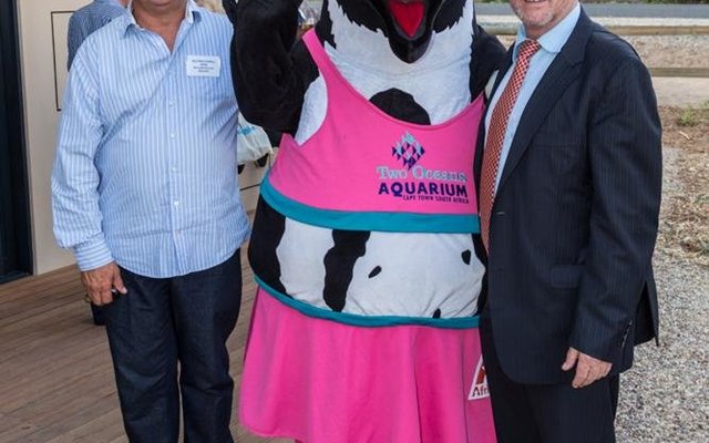 Wilfred Chivell and Samantha, the Two Oceans Aquarium Penguin mascot with Minister Derek Hanekom